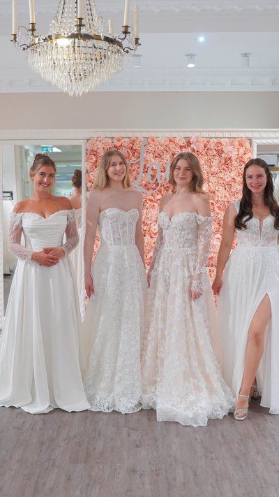 Modelle tragen verschiedenen Brautkleid-Stile